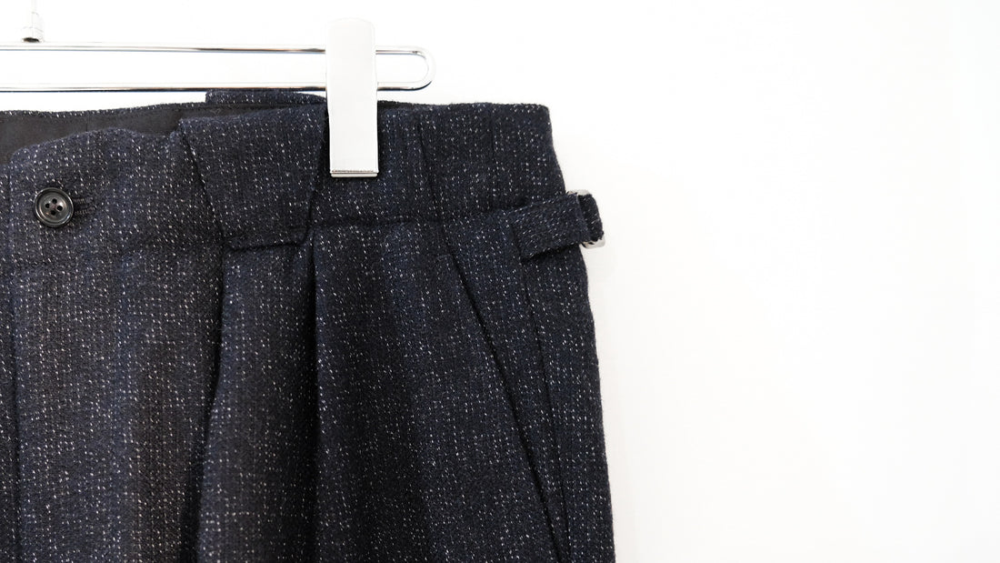 ちら|MELANGE CHAIN TWILL TUCKED TROUSERS|ULTERIOR 24AW|えん -en-